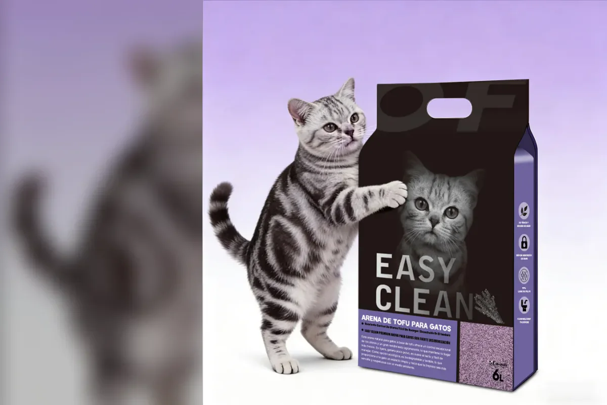 Official Emily pets tofu cat litter package beside a silver tabby cat
